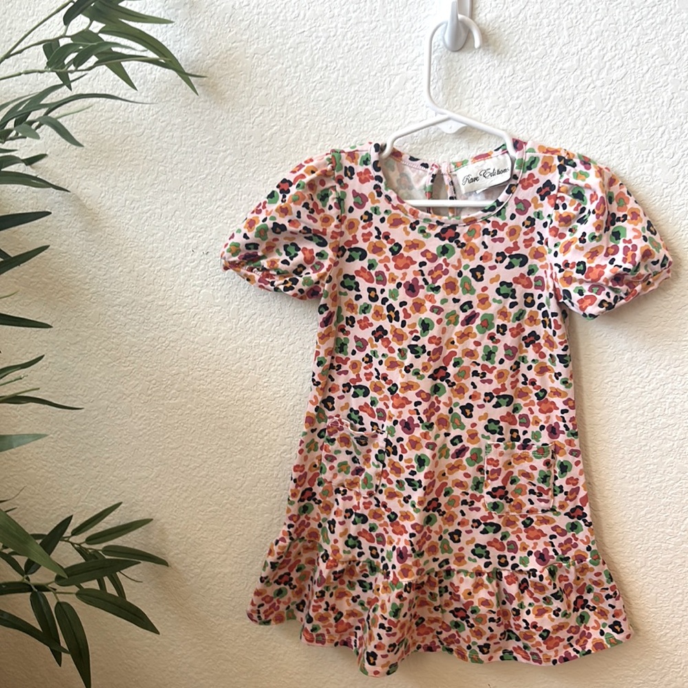 Very gently used pale pink abstract leopard dress size 4